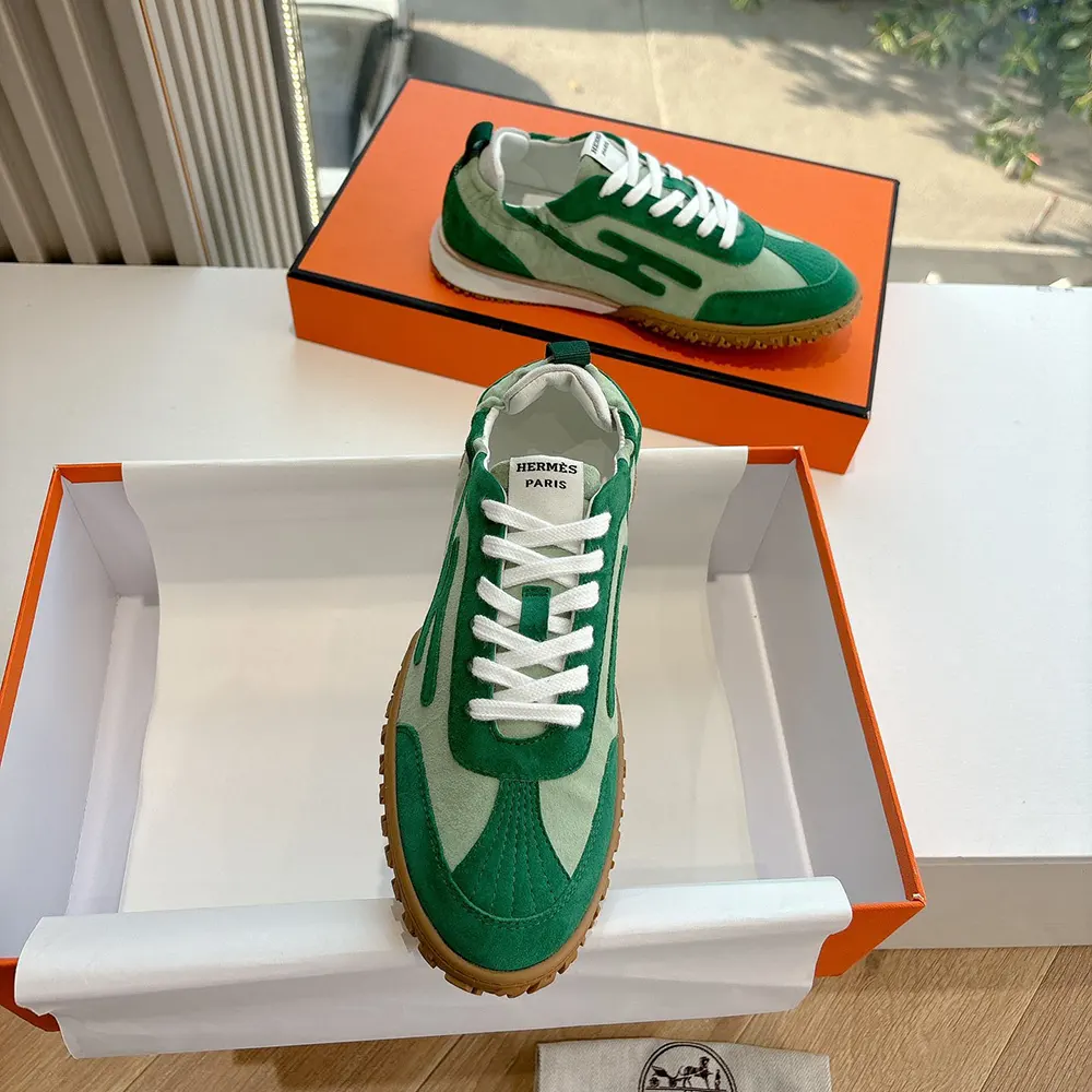 Top-down view showing lace closure on Hermes Unisex Jet Sneaker green