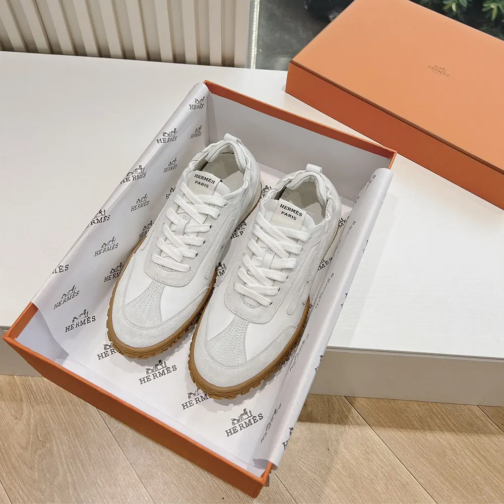 Overhead view showcasing texture of technical canvas and goatskin on Hermes Jet Sneaker