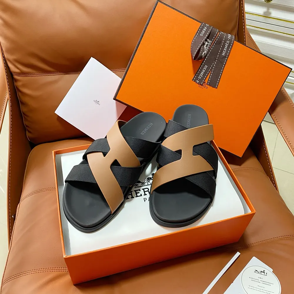 Top view of Hermes Unisex Kazimir Sandal-Brown/Black highlighting open-toe design