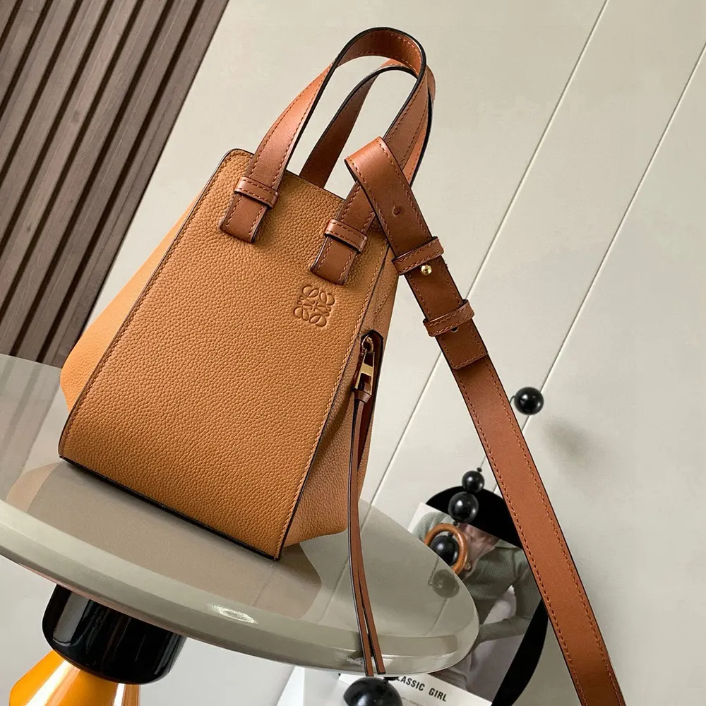 Close-up of knotted leather strap detail on Loewe Compact Hammock Bag