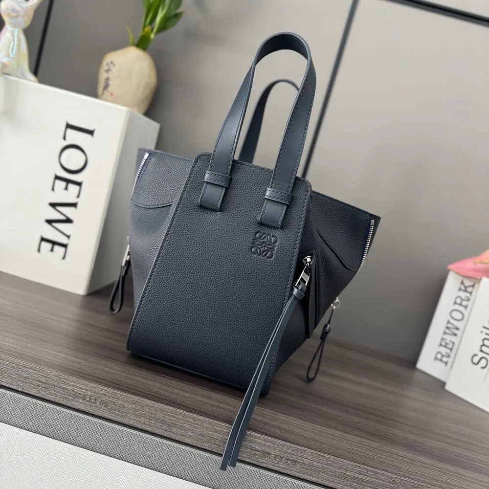 Close-up on soft grained calfskin texture of Loewe Compact Hammock Bag