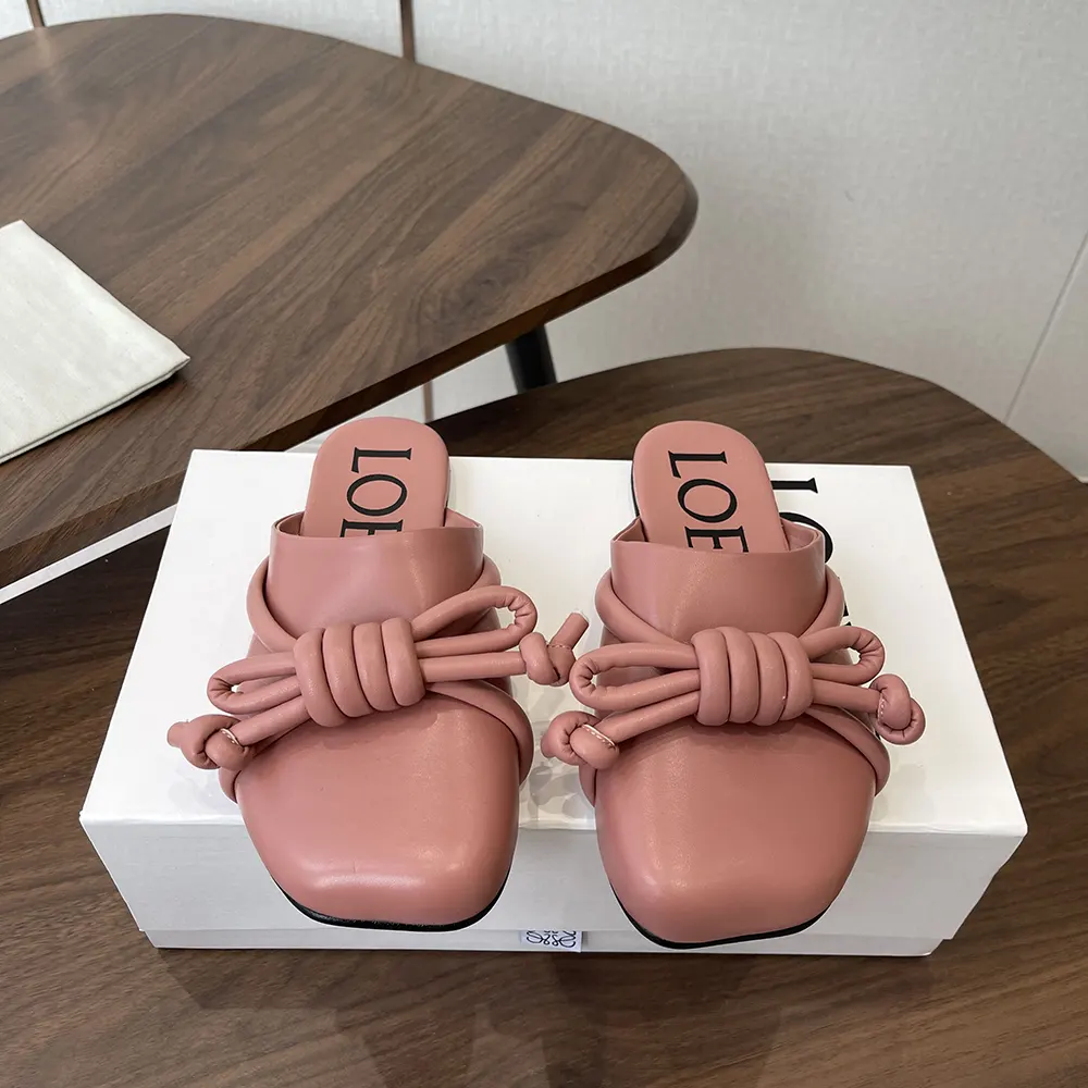 Close-up of soft lambskin and Flamenco knot on Loewe mule