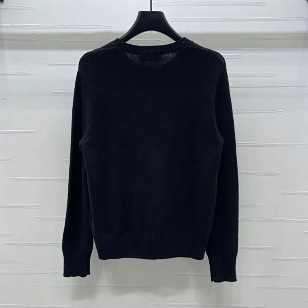 Close-up of cashmere knit texture on Miu Miu Women Cashmere Crew-Neck Sweater-Black