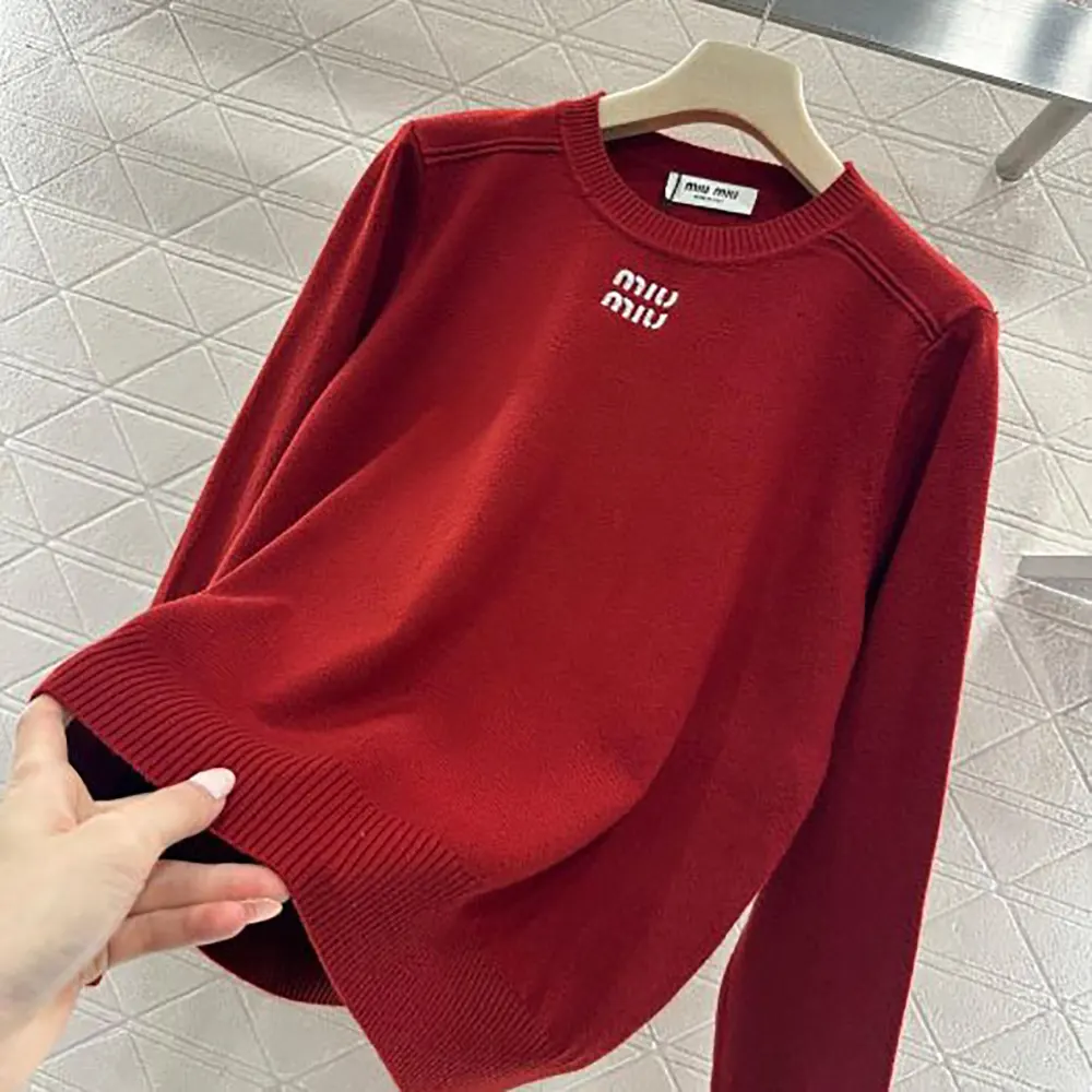 Side angle showing relaxed fit of Miu Miu Women Cashmere Crew-Neck Sweater-Red