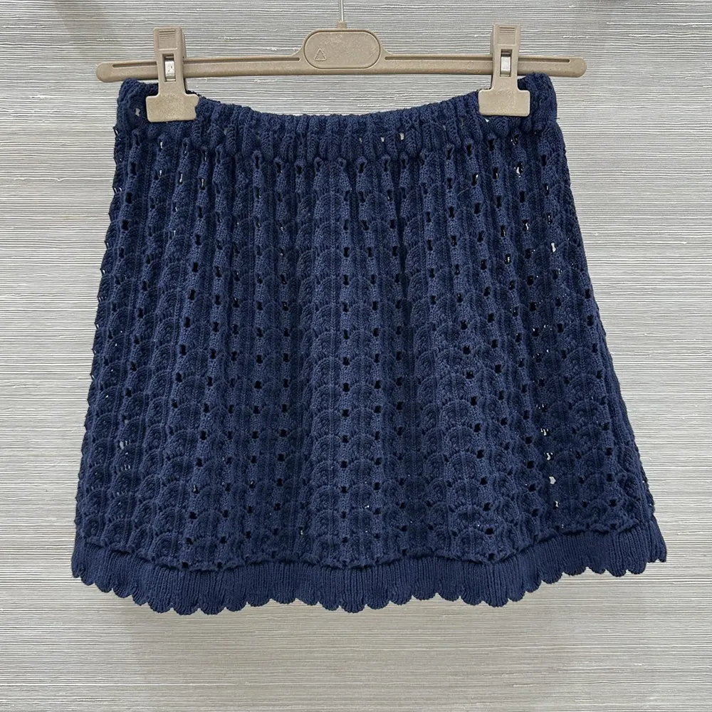 Side angle showing silhouette of Miu Miu Women Cotton Miniskirt-Nvay