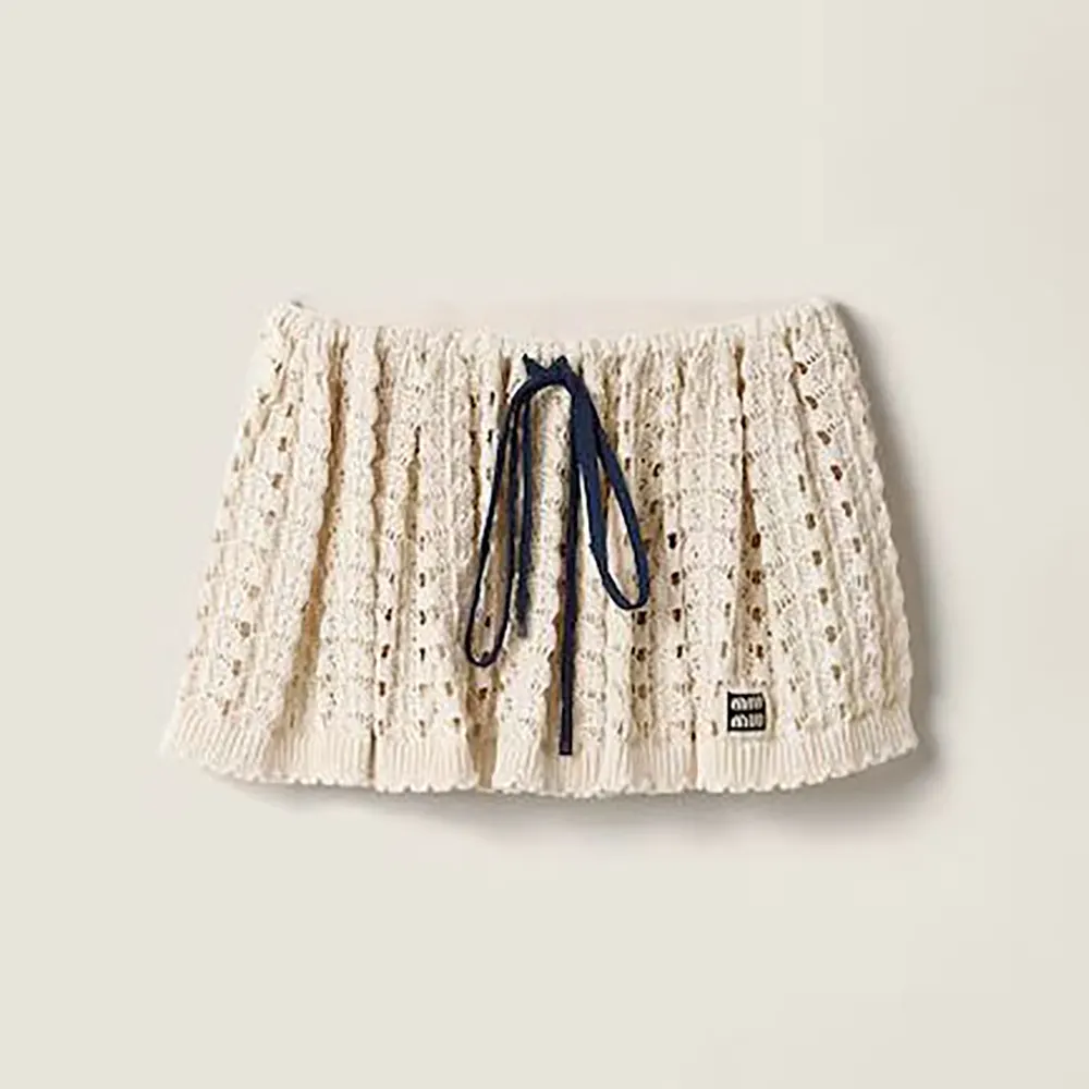 Front view of Miu Miu Women Cotton Miniskirt-White on mannequin