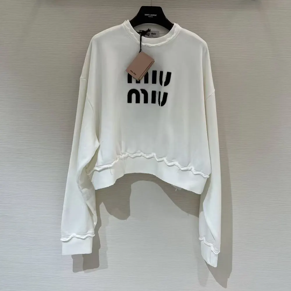 Close-up of logo embroidery on Miu Miu Women Cotton Sweatshirt-White