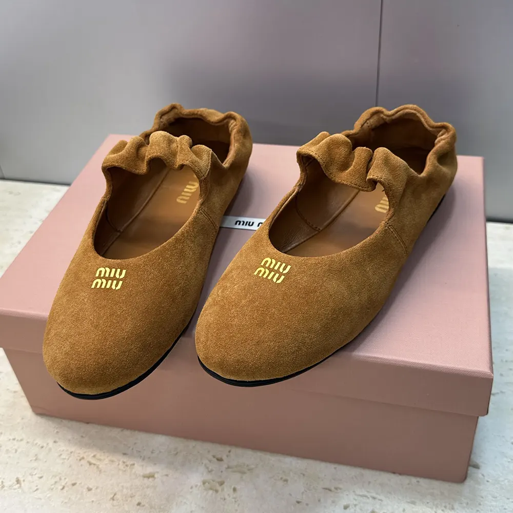 Top view showcasing sleek silhouette of Miu Miu Women Ruches Suede Ballerinas
