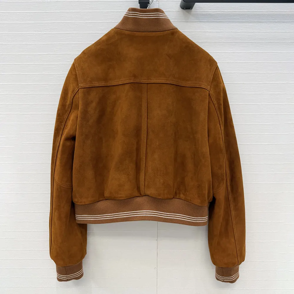 Side profile of Miu Miu Women Suede Blouson Jacket-Brown highlighting silhouette