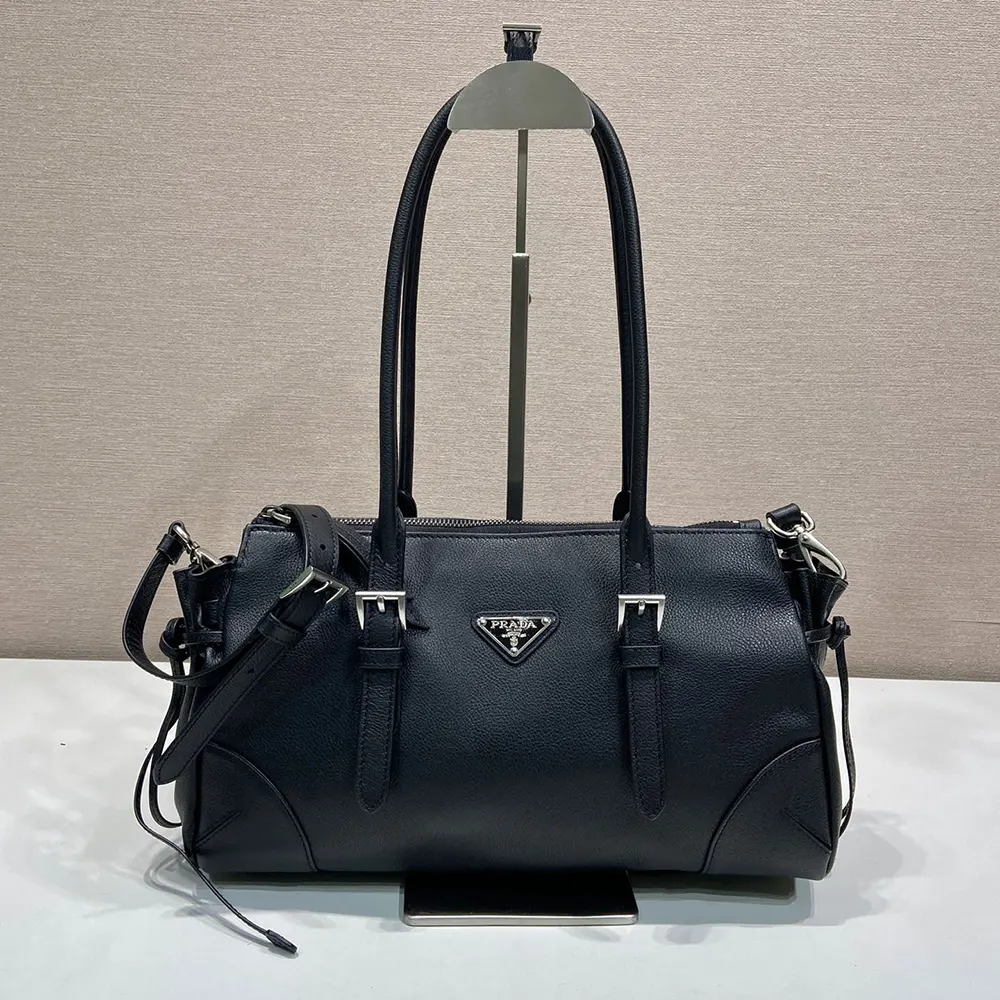 Close-up of polished silver hardware on Prada Women Bonnie tote