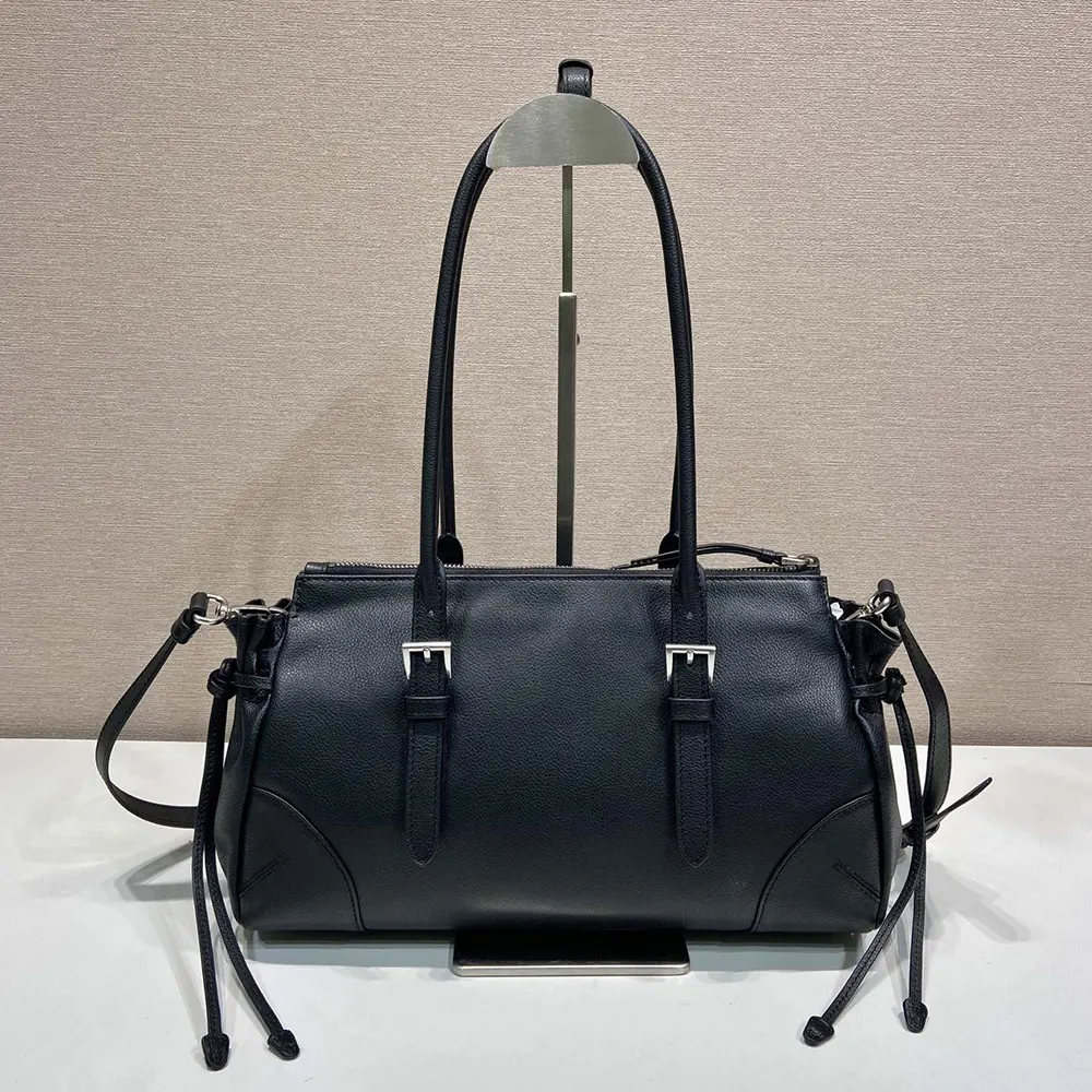 Side profile showing structured silhouette of Prada Women Bonnie tote bag