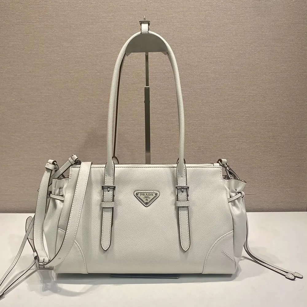 Close-up of silver-tone hardware on Prada Women Bonnie Medium Leather Tote