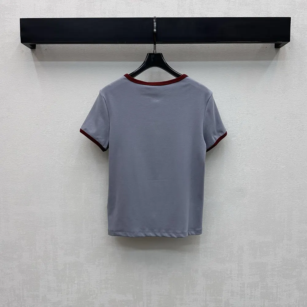 Side angle showing relaxed fit of Prada Women Cotton T-Shirt-Light Blue