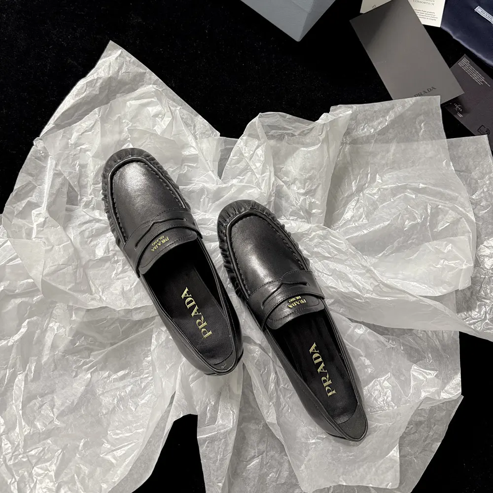 Top view of Prada Women Leather Loafers-Black highlighting smooth leather