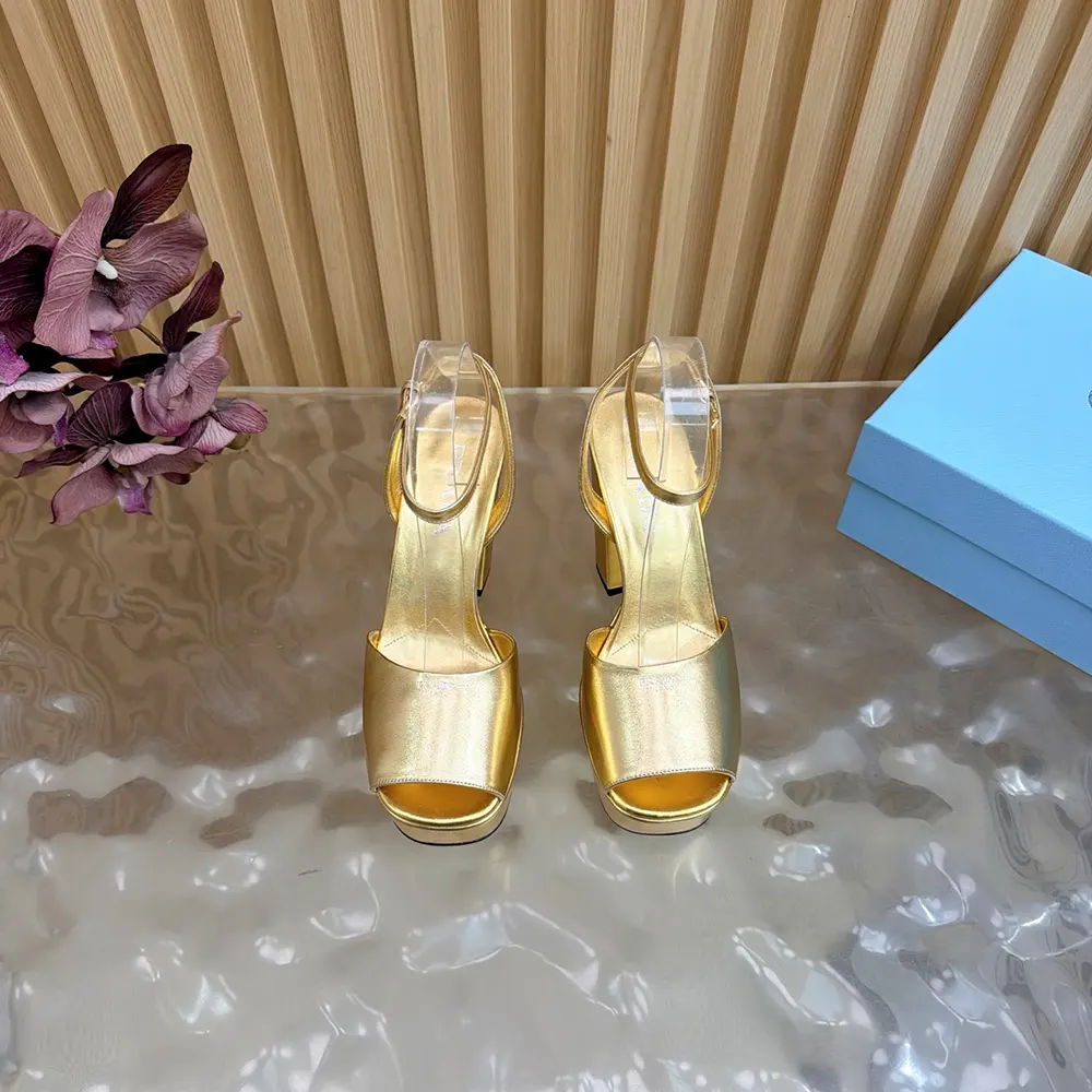 Close-up of gold buckle and nappa leather on Prada platform sandals