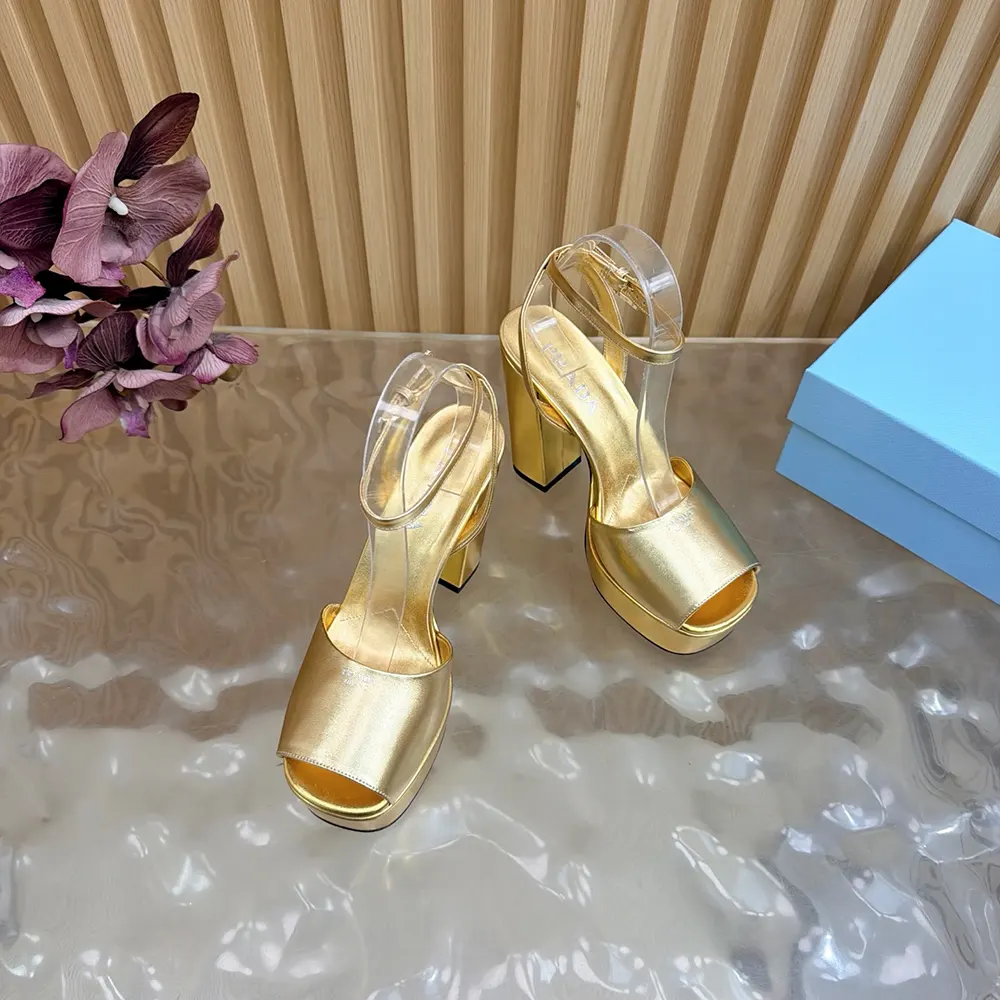Angled shot of Prada Women Mordoré Nappa Leather Platform Sandals-Gold heel