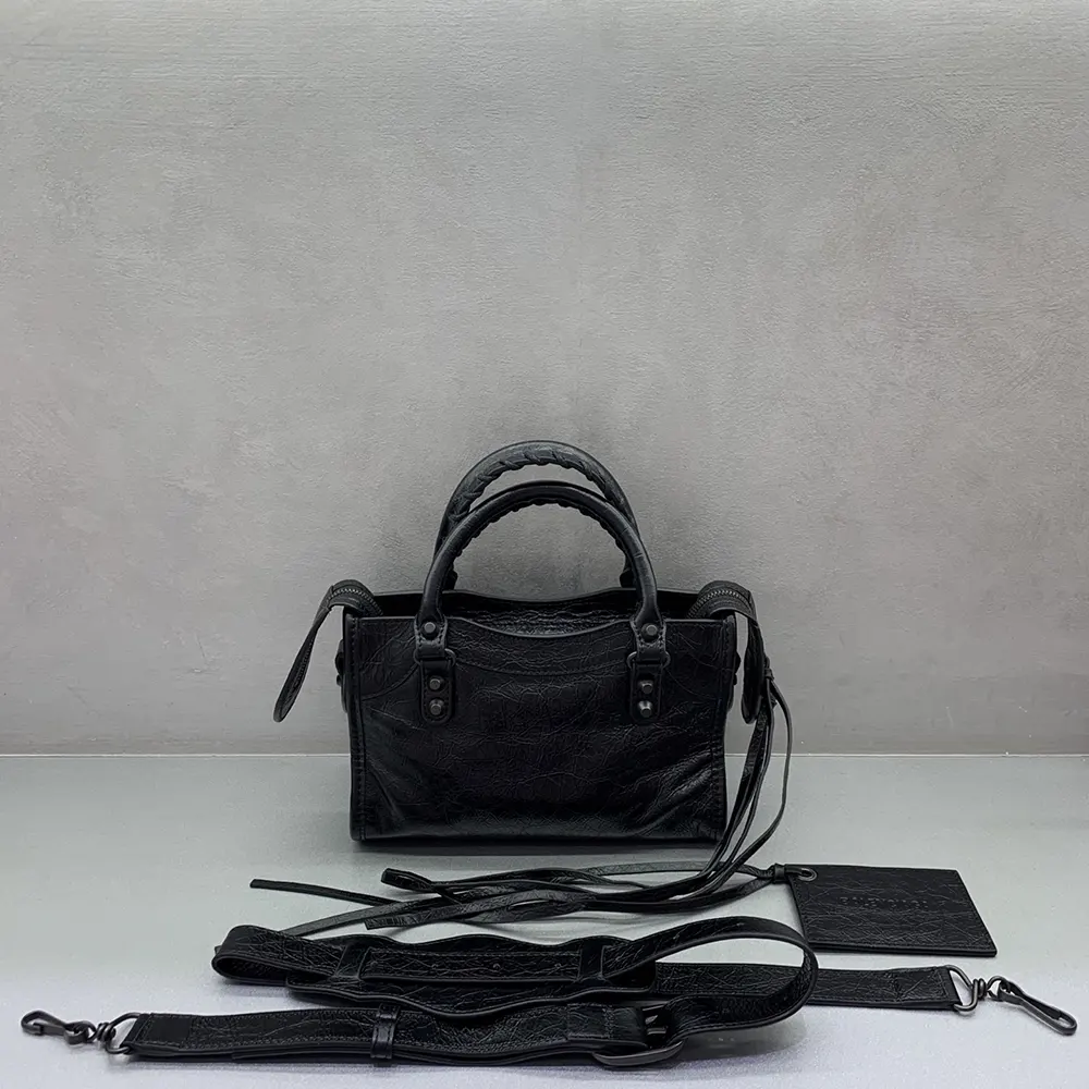 Side view showing compact silhouette of Balenciaga Women Le City Bag Nano