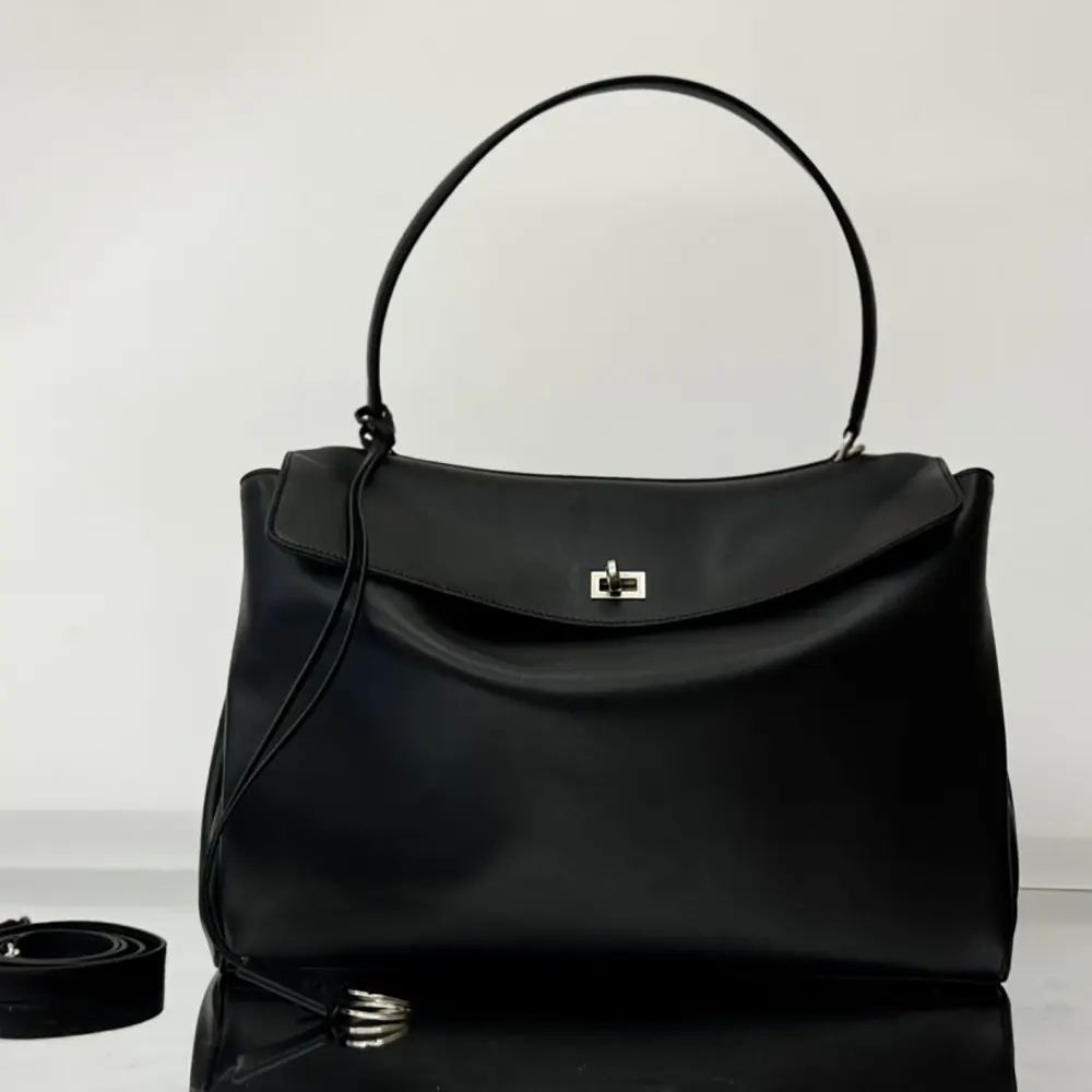 Close-up of aged-silver hardware on Balenciaga Women Rodeo Handbag Large