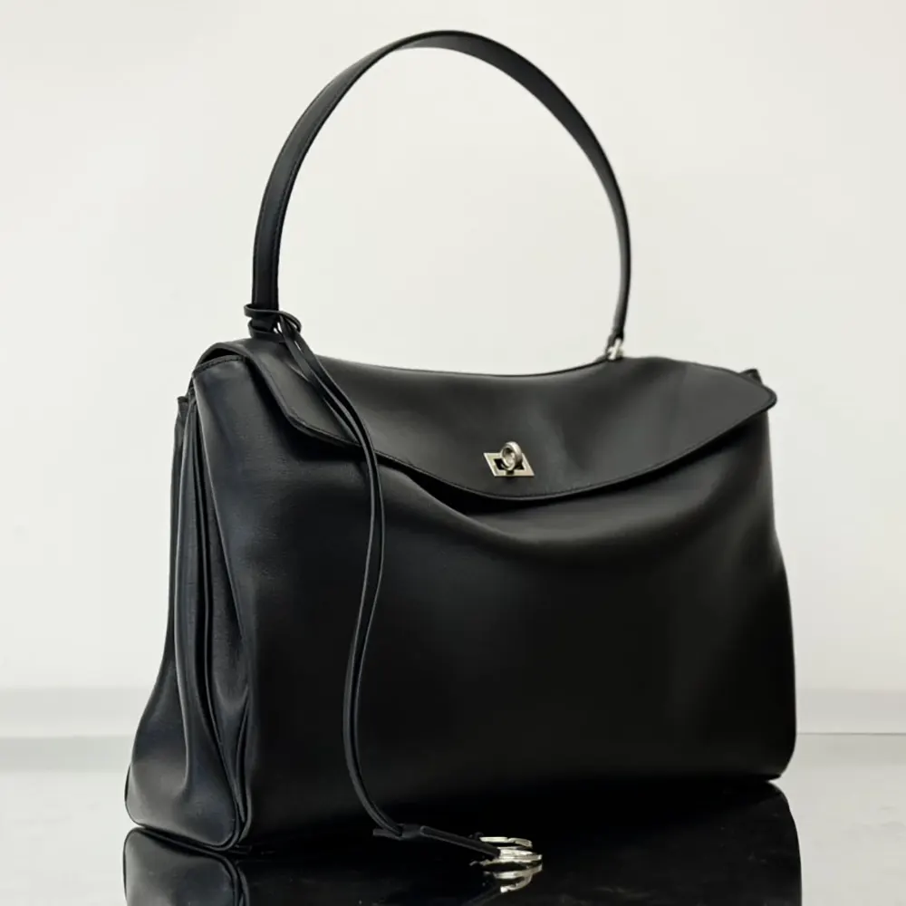 Side profile showing silhouette of Balenciaga Women Rodeo Handbag Large