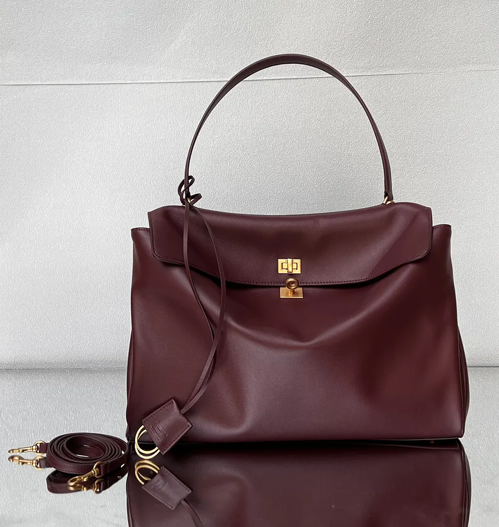 Close-up of aged-gold hardware on Balenciaga Women Rodeo Handbag Large