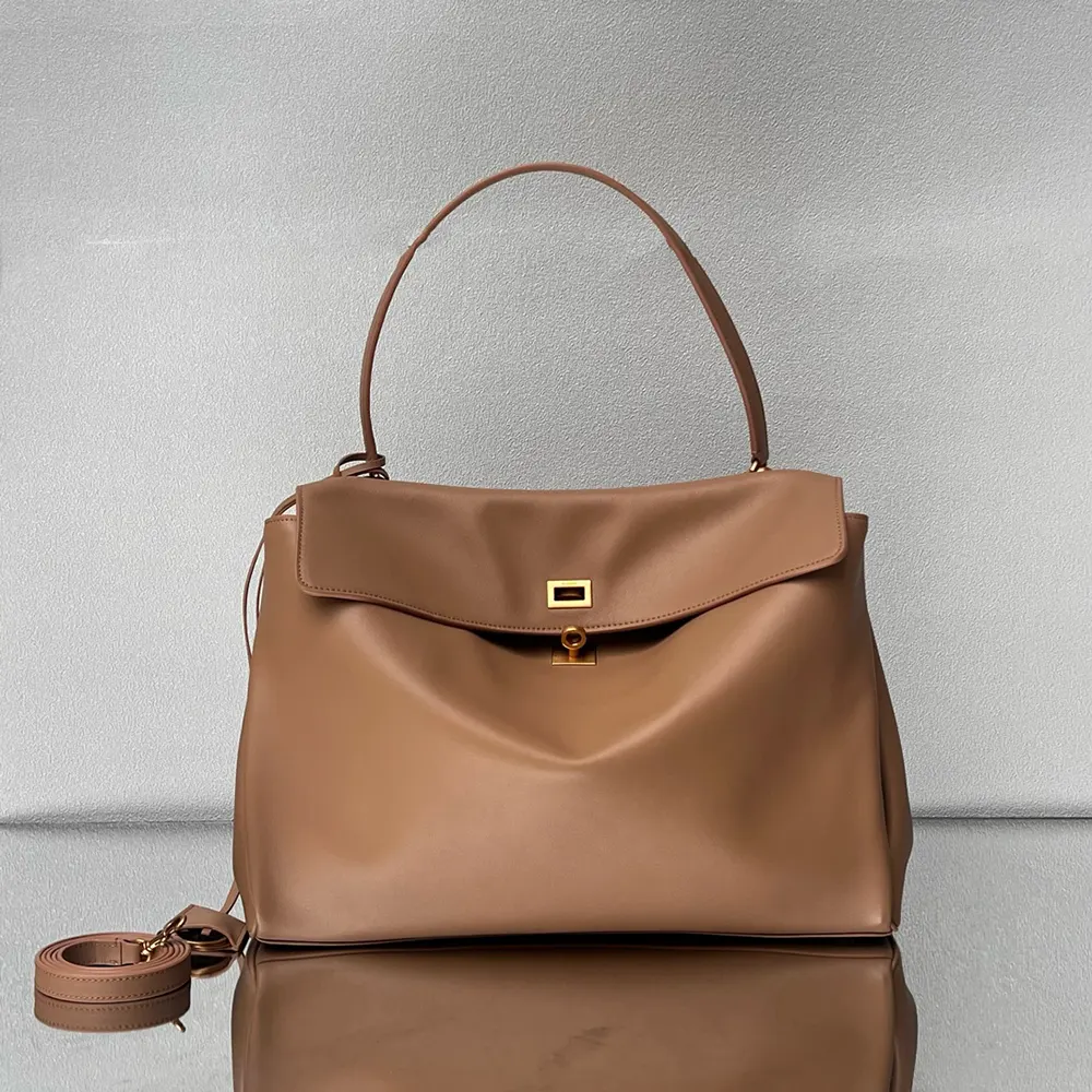 Close-up of aged-gold hardware on Balenciaga Women Rodeo Handbag Large