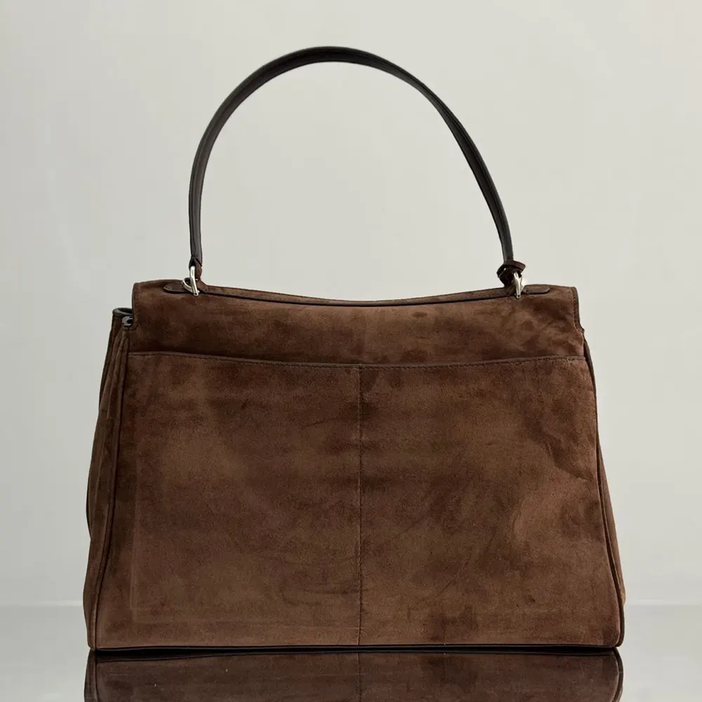 Side angle showing silver-tone hardware on Balenciaga Women Rodeo Handbag