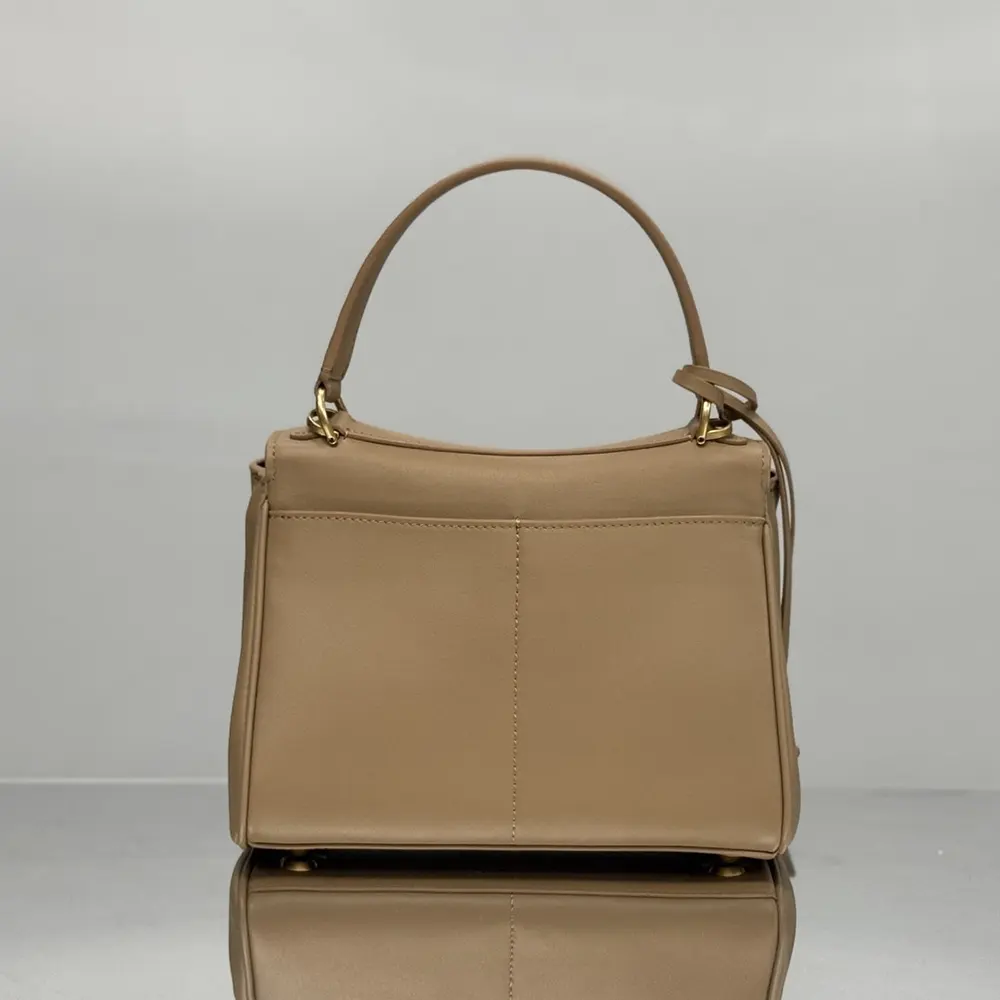 Side angle showing compact silhouette of Balenciaga Women Rodeo Handbag Mini