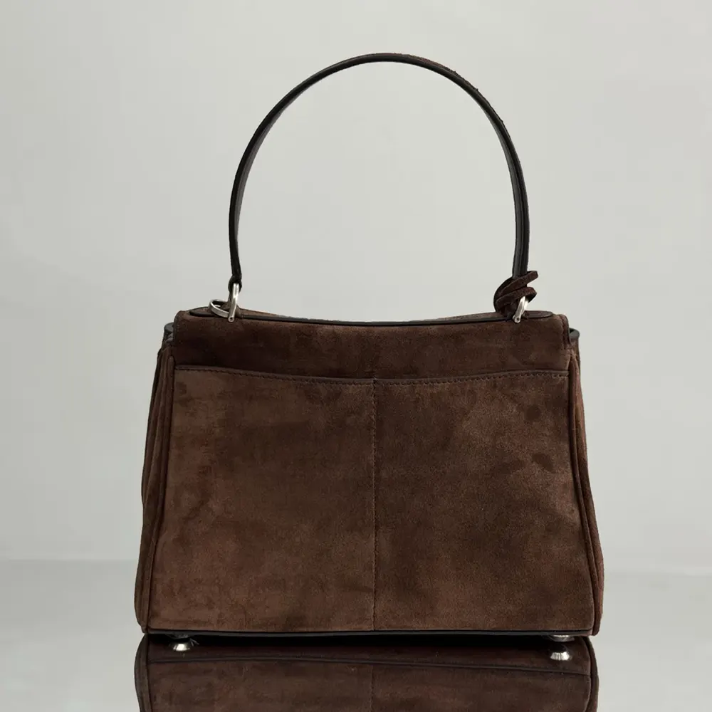 Side angle showing waxed suede texture of Balenciaga Women Rodeo Handbag Small