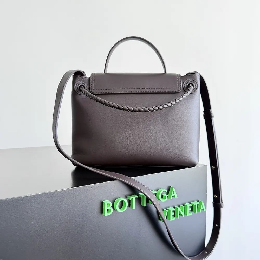 Side angle showing adjustable strap on Bottega Veneta bag