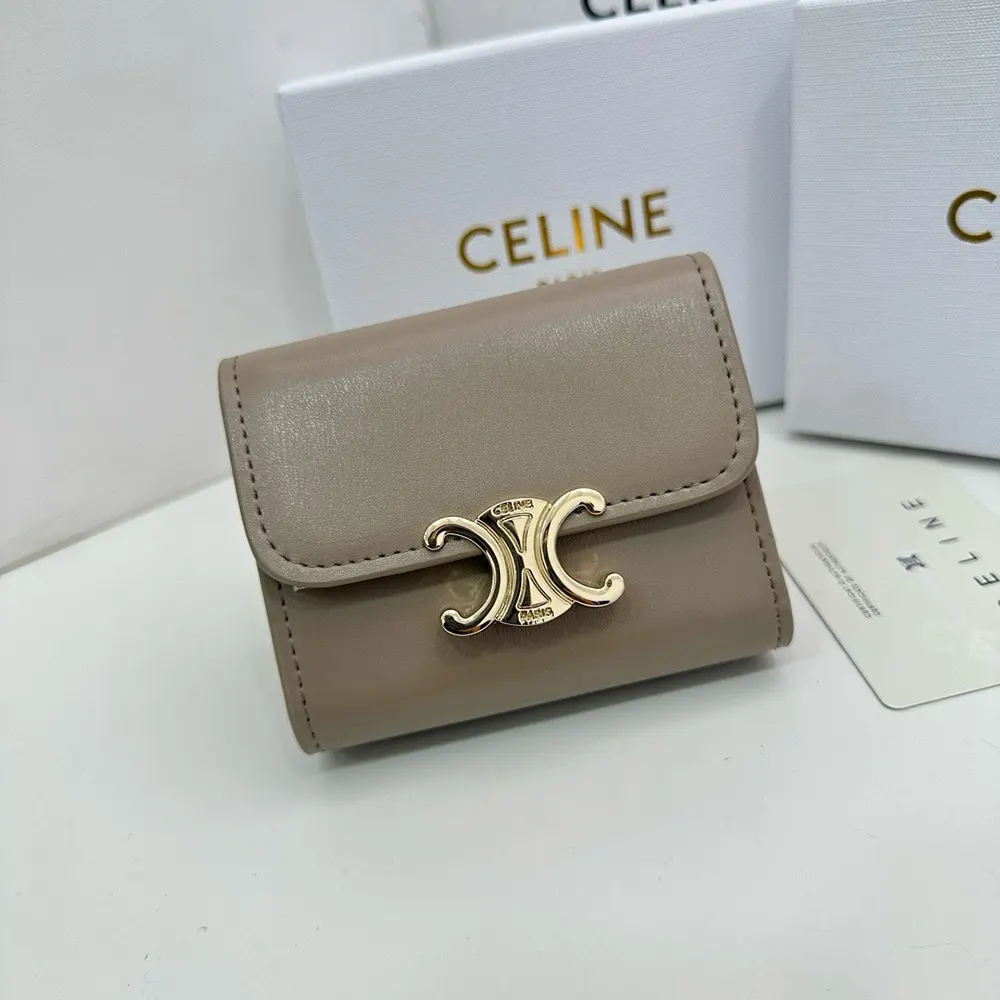 Open interior of Celine Women Compact Wallet showing card slots and coin compartment