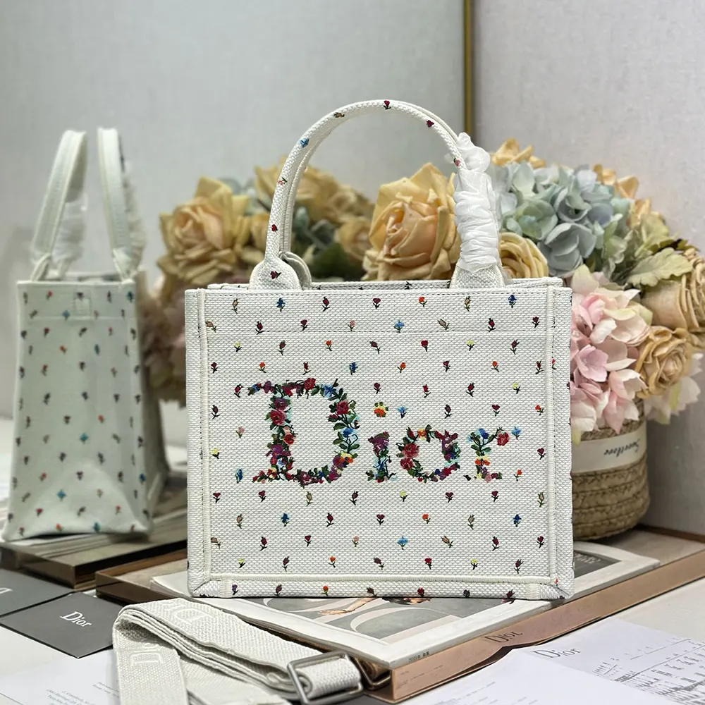 Close-up of Dioramour stitching and leather trim on small Dior tote