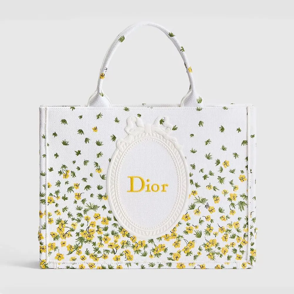 Front view of Dior Women Medium Dior Book Tote with strap in white canvas