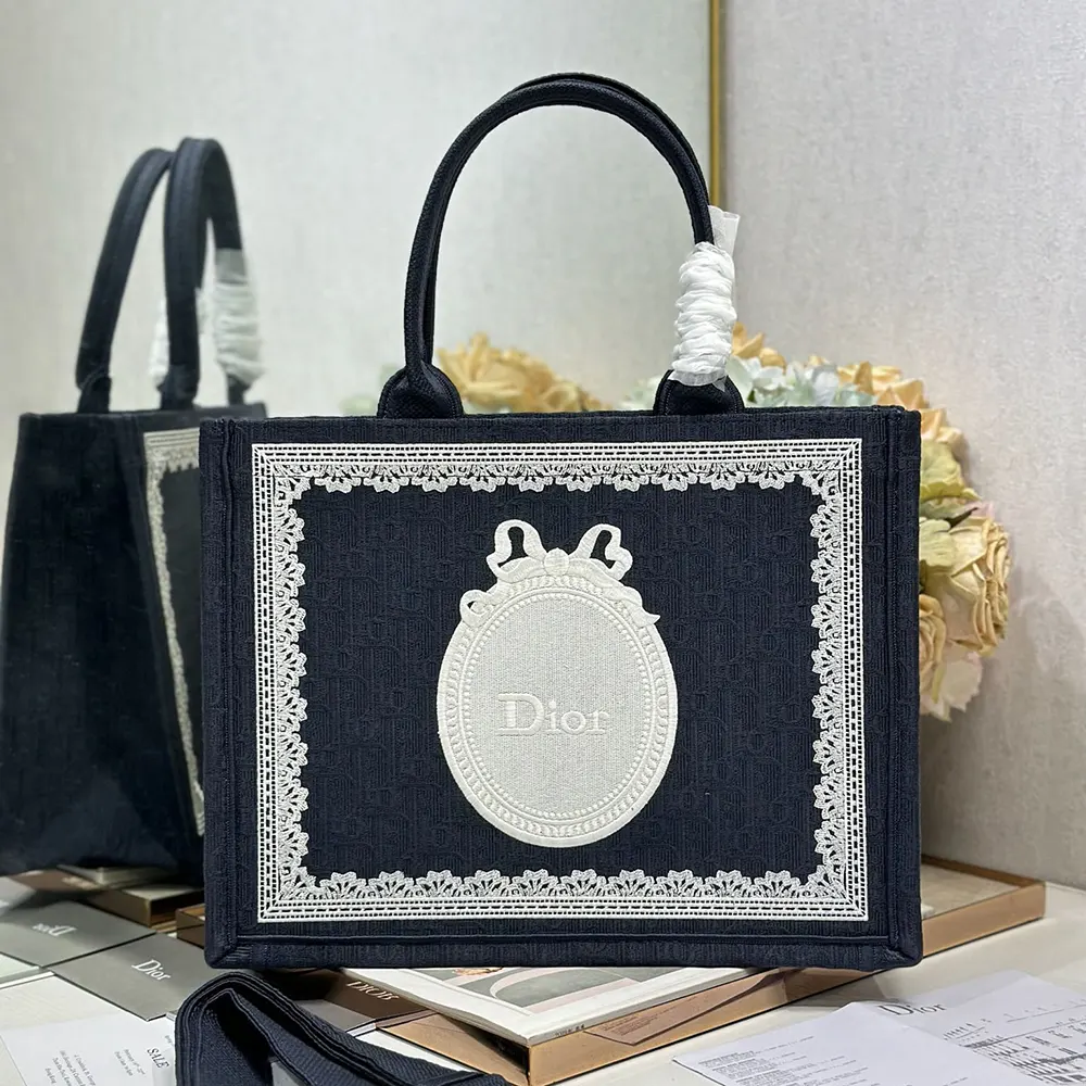 Close-up of white lace detail on Dior Women Medium Dior Book Tote with Strap