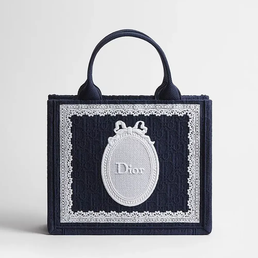 Front view of Dior Women Small Dior Book Tote with Strap in navy embroidery