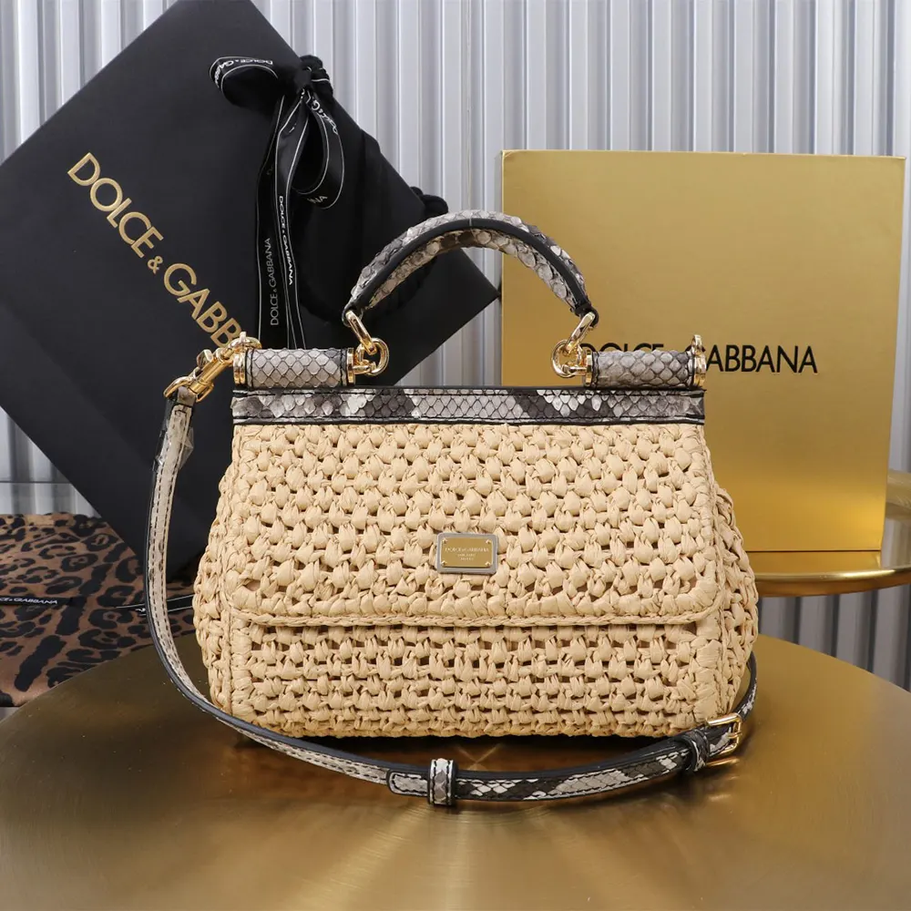 Close-up of gold-tone hardware and crochet raffia detail on mini Sicily handbag