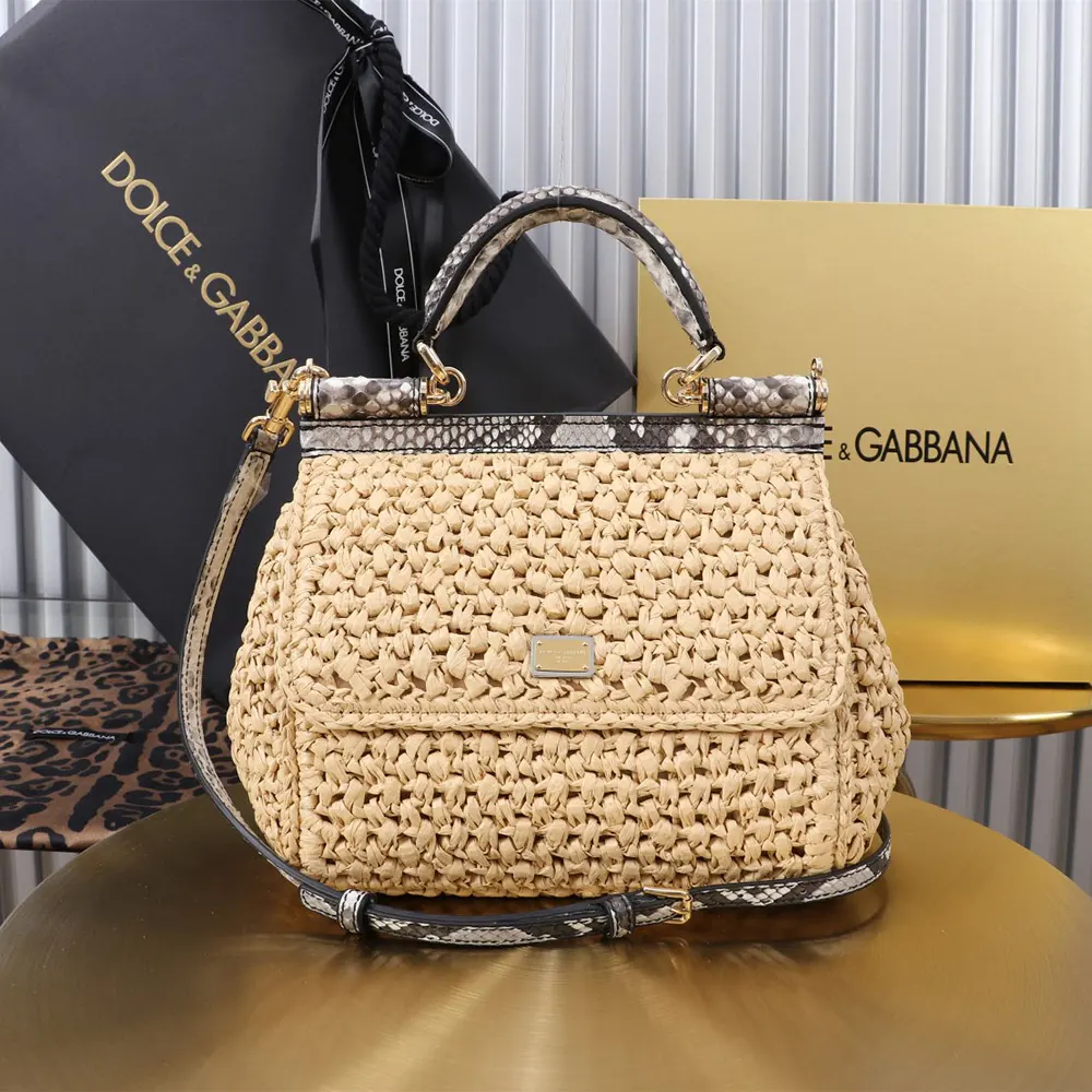 Close-up detail of gold-tone D&G logo on Small Sicily Handbag