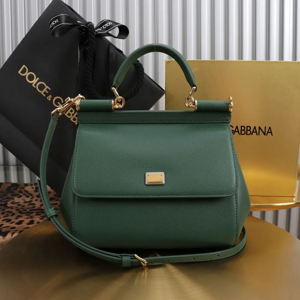 Side angle showing structured silhouette of Dolce Gabbana D&G Small Sicily Handbag