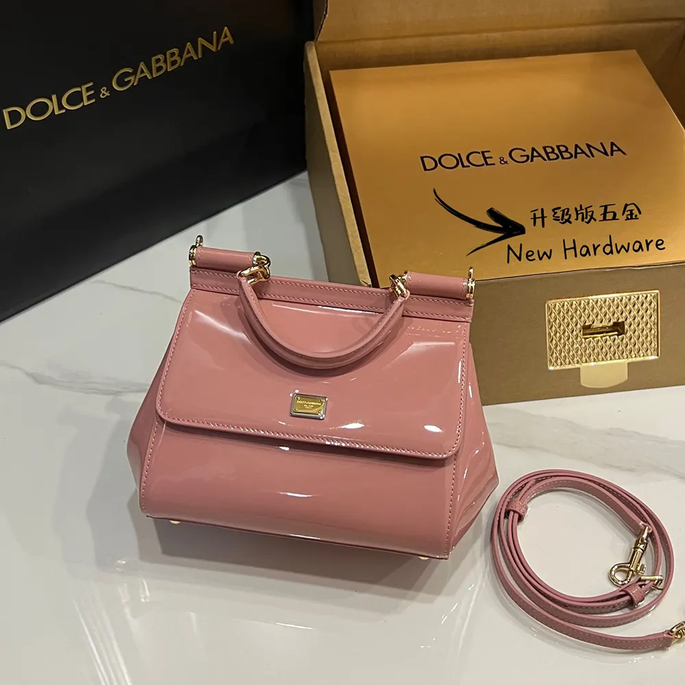 Close-up of gold D&G hardware on Small Sicily Handbag in vibrant pink