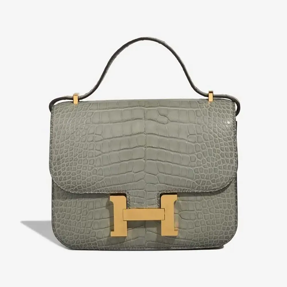 Front view of Hermes Women Constance 18 Matte Alligator Gris Cement-Grey bag