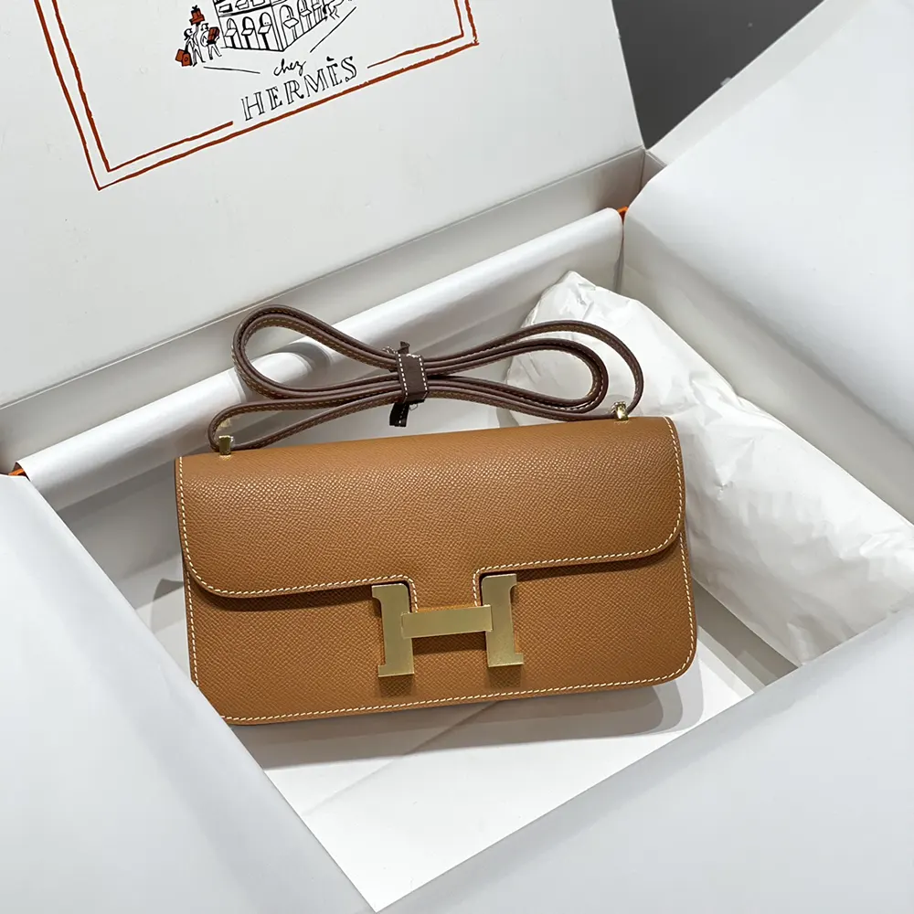 Side profile showing structured silhouette of Hermes Women Constance Elan bag