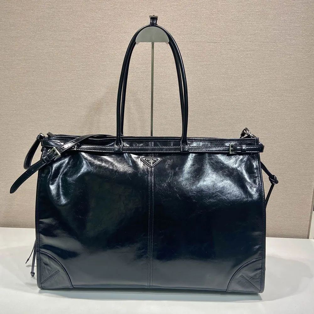 Close-up of silver-tone Prada logo on Bonnie Leather Tote Bag