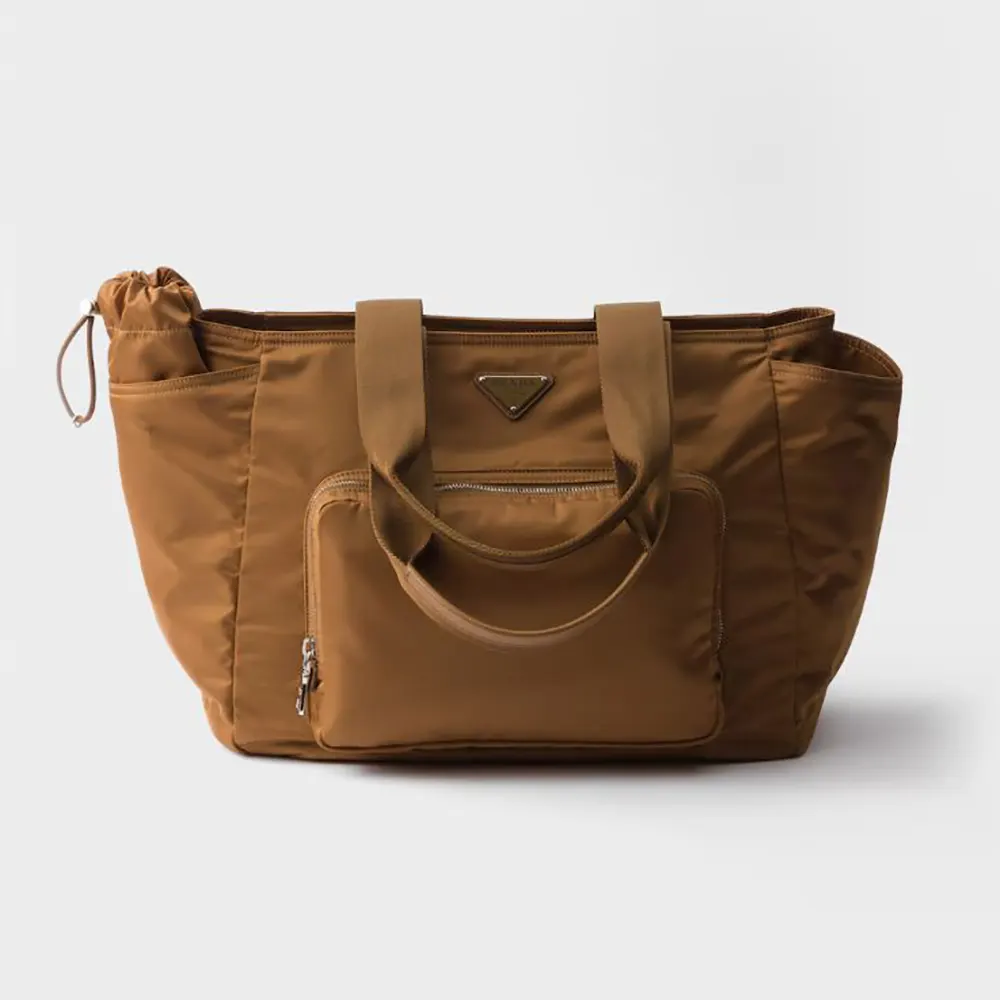 Front view of Prada Unisex Re-Nylon Baby Bag with Triangle Logo-Brown