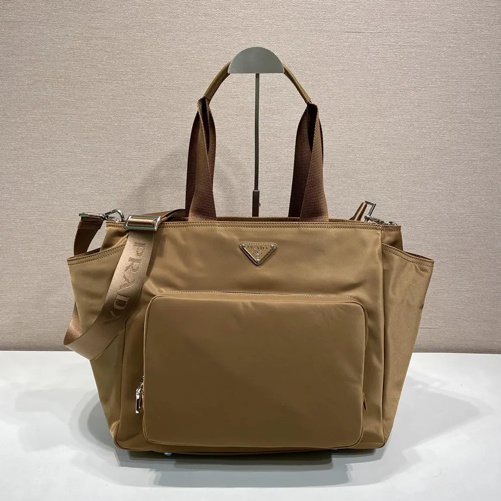 Side angle showing adjustable strap and compact shape of Prada Baby Bag