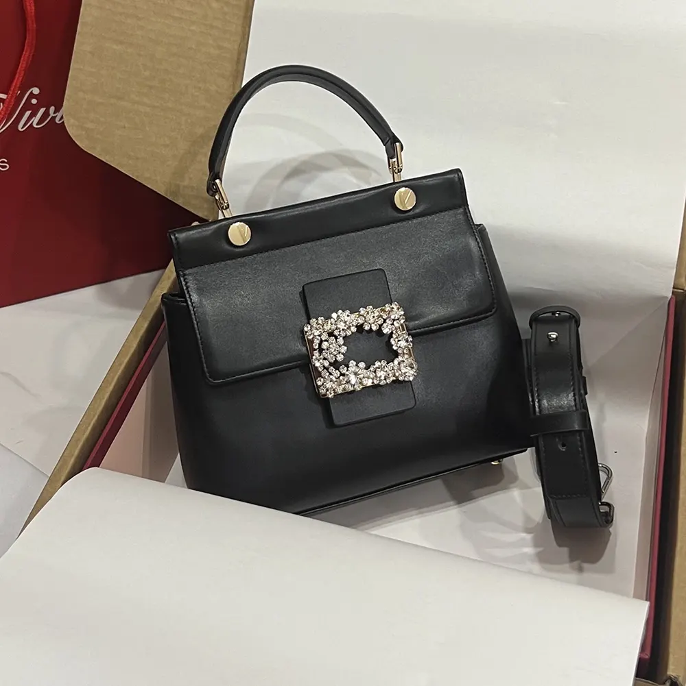 Close-up of signature crystal buckle on Roger Vivier Cabas Efflorescence Mini Bag