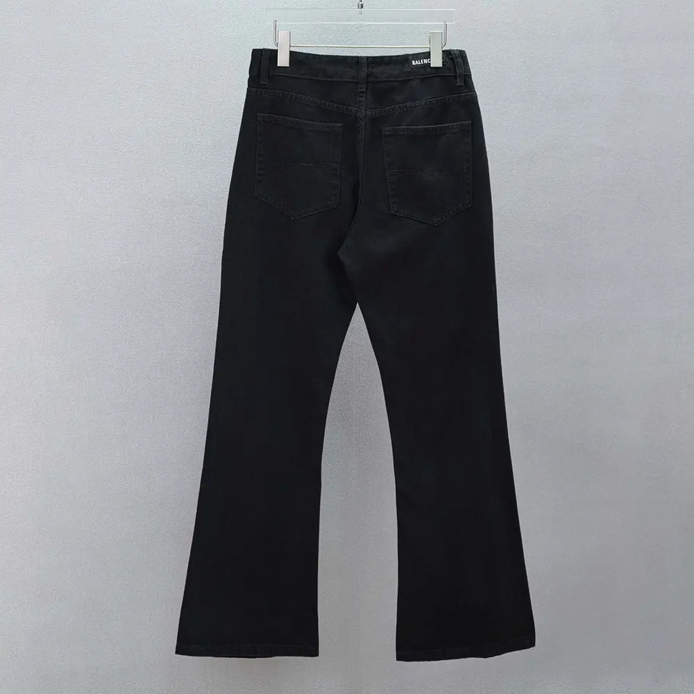 Side profile showing flared silhouette of Balenciaga Women Flared Pants