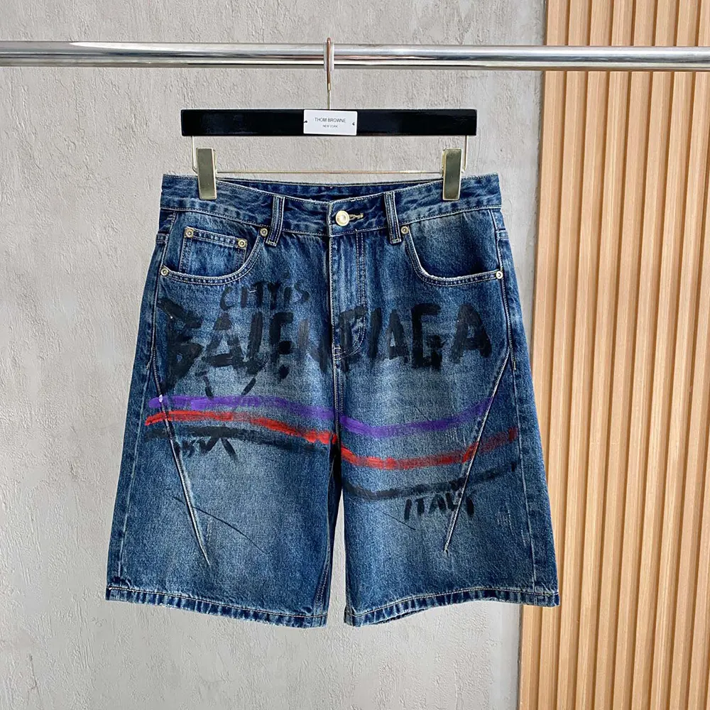 Close-up of folded detailing and fabric texture on shorts
