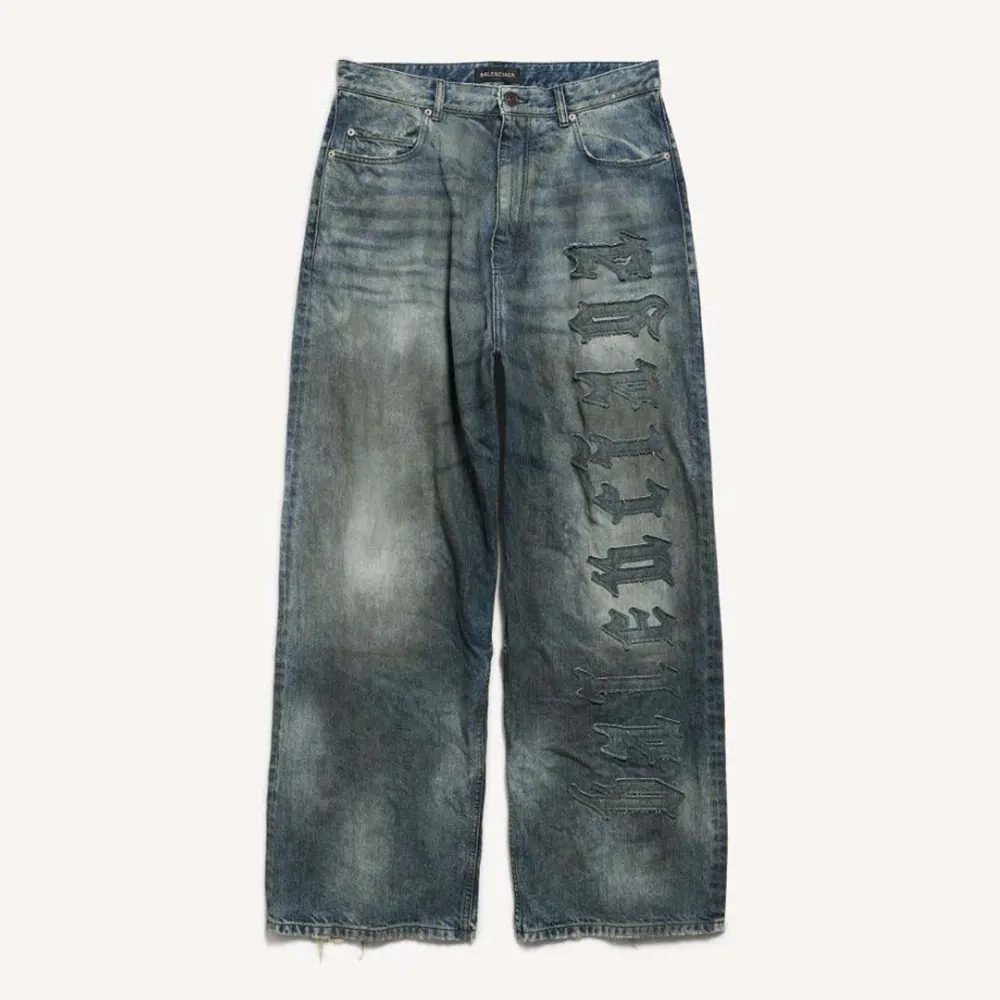 Front view of Balenciaga Women Minimal Baggy Pants in dirty grey and light blue denim
