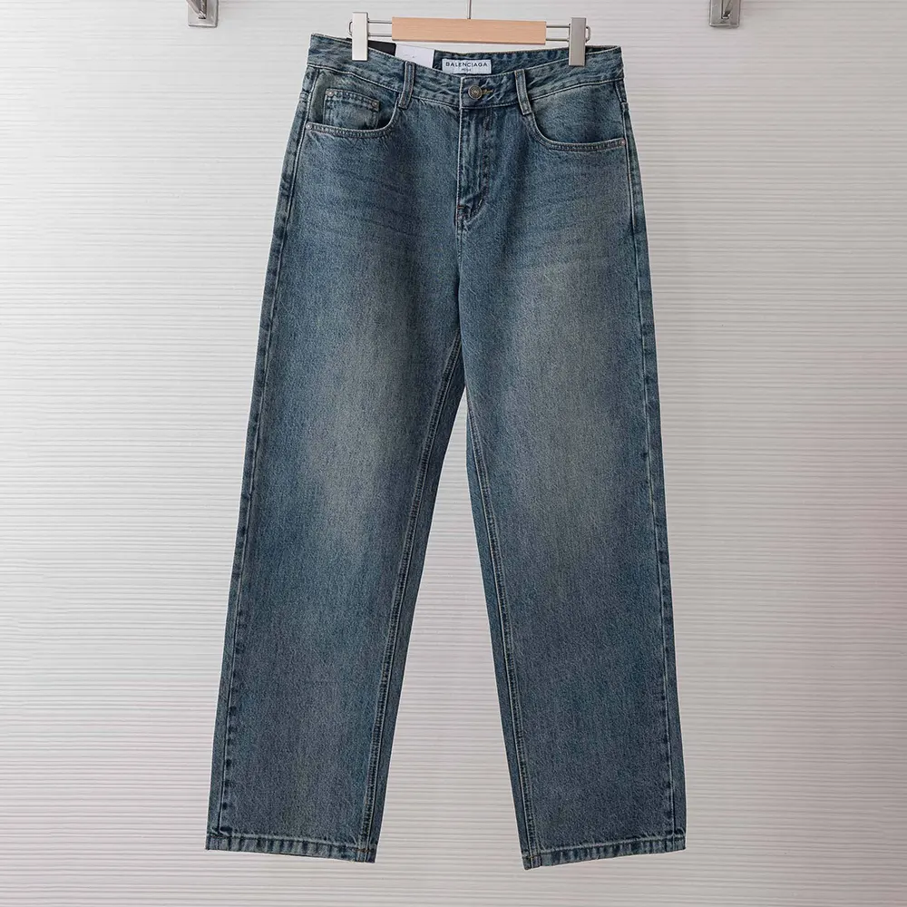 Close-up of signature button and zip fly on Balenciaga jeans