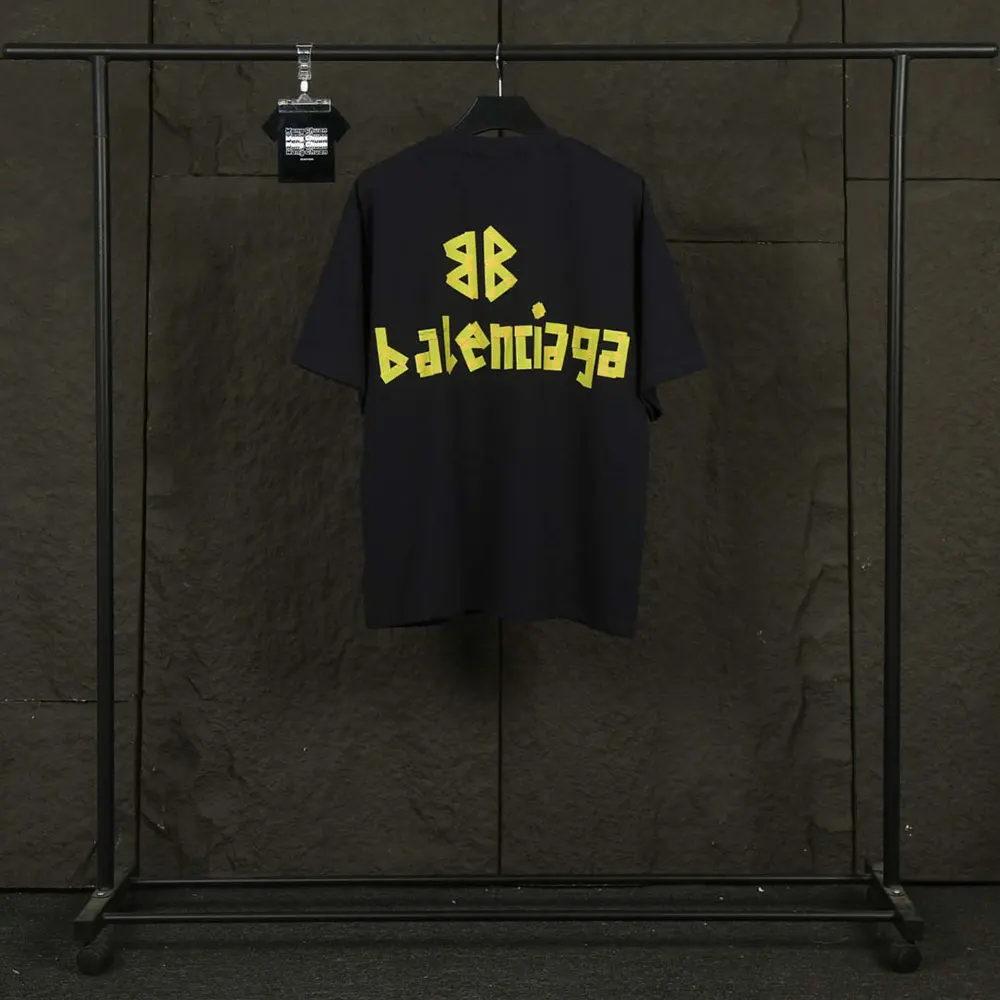 Close-up of signature tape branding on black vintage jersey Balenciaga T-shirt
