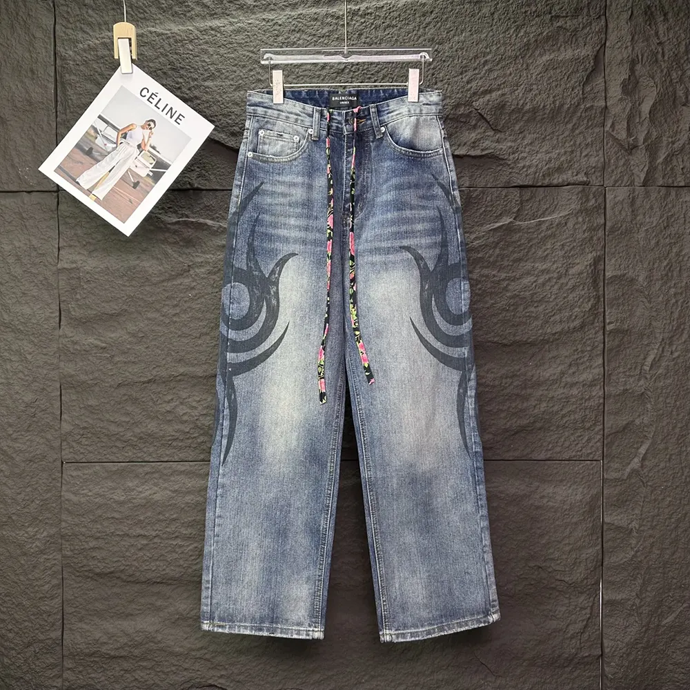 Close-up on waistband and zip closure of Balenciaga baggy pants